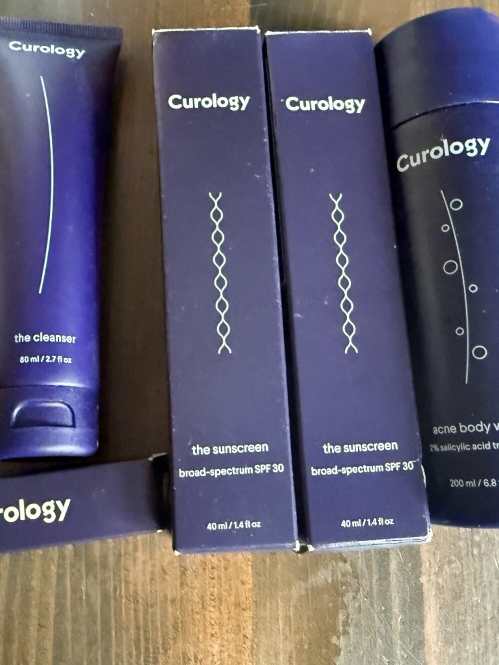 Curology Lot Sunscreen Body Wash Lip Balm Cleanser